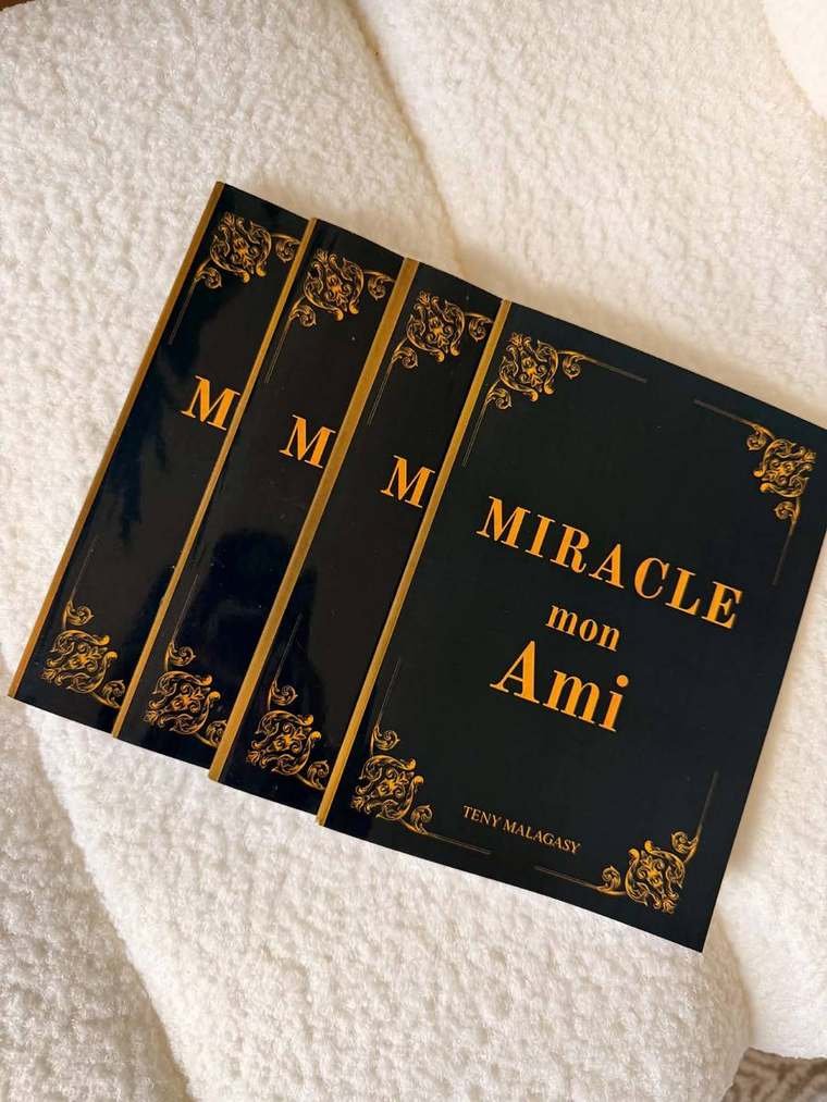 Le livre Miracle mon Ami — couverture noire et dorée